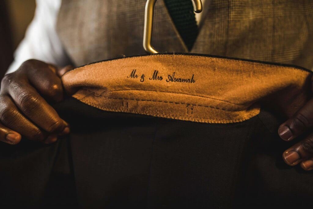 Close up shot of the personalisation of a suit jacket collar.